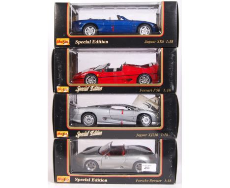 A collection of 4x Maisto Special Edition 1:18 scale diecast model cars. Comprising of; Porsche, Jaguar XK8, Ferrari and Jagu