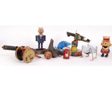 A collection of assorted antique and vintage tinplate (and other) toys. Comprising of an Uncle Sam style carved wooden 'walke