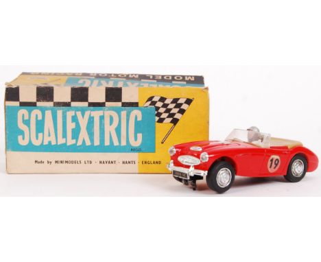 An original vintage Scalextric slot car C.74 Austin Healey 3000 No.19. Within the original correctly stamped box.