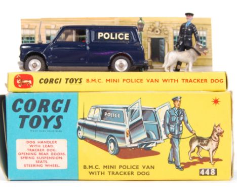 An original vintage Corgi Toys diecast model 448 BMC Mini Police Van With Tracker Dog. Complete, with dog and policeman figur