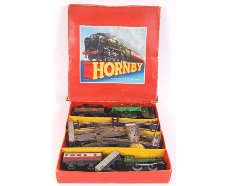 A vintage Hornby 0 gauge tinplate clockwork trainset Goods Set 30 featuring 45746 locomotive. Along with extra 0 gauge wagons