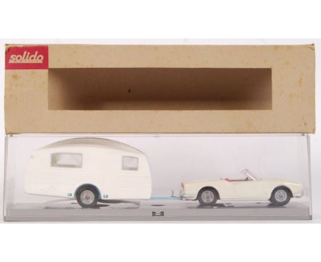 A rare vintage c1960's Solido made diecast model 1:43 scale car and caravan set No.158. Appears very near mint to mint, withi