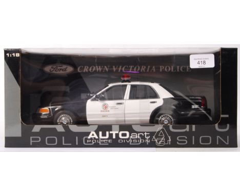 A fantastic precision detail Autoart diecast model 1:18 scale LAPD Police Dept Car. Appears mint, and unused, within the orig