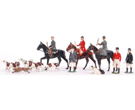 A rare complete Britains made lead figure Fox Hunting set. Comprising of several huntsmen / ladies, 7x hounds and the fox. Co