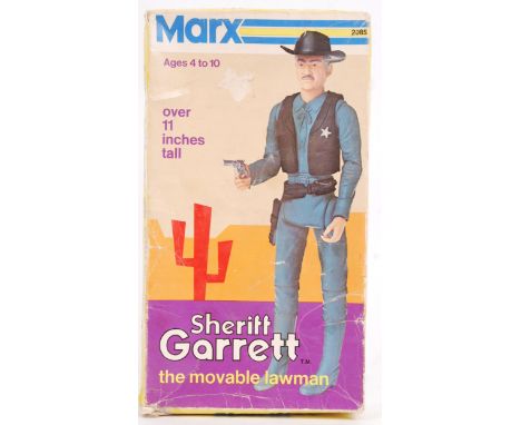 A rare original vintage Marx Toys Johnny West style action figure of ' Sheriff Garrett .' Appears complete, within the origin