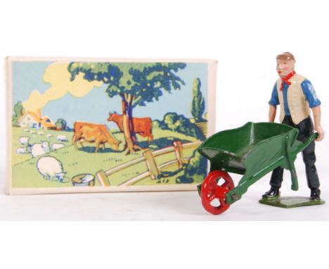 An original vintage Britains Farm lead / hollowcast figure set 5022 ' 1 Man 1 Wheelbarrow '. Green barrow, with man in blue a