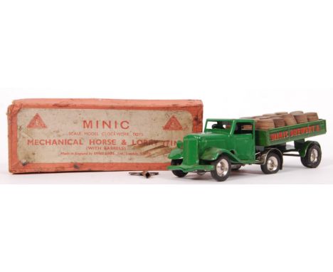 A rare vintage Triang Minic ' Mechanical Horse & Lorry With Barrels ' tinplate clockwork toy. In green Minic Brewery livery. 