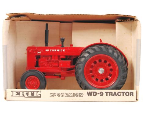 An original vintage ERTL 1:16 scale diecast model McCormick WD-9 Tractor. Precision diecast, large scale model. Appears mint 