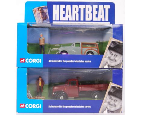 A collection of 2x original 1:43 scale Corgi Heatbeat diecast model cars with figures to include; CC01701 Morris Minor Travel