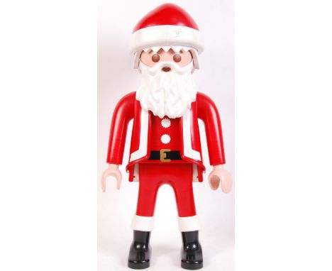 An original Playmobil large scale Christmas Santa figure 6629. Ex-shop window advertising display. Impressively over-scaled f