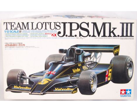 A 1:12 scale Tamiya Formula One racing car model kit: Team Lotus JPS Mk III. Appears mint and unused (and complete) with all 