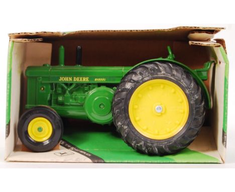 An original vintage ERTL 1:16 scale diecast model John Deere Model R Tractor. Precision diecast, large scale model. Appears m