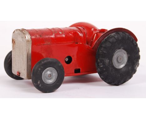 An original vintage charming Triang Minic Toys clockwork tinplate farm tractor. Working order, with Triang key. Red, with ori