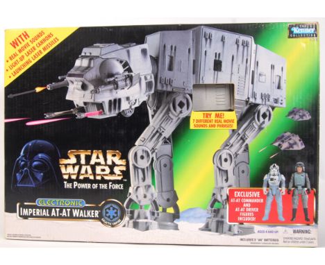 A Kenner Collection made Star Wars action figure playset Electronic ' Imperial AT AT Walker .' Within the original box. Vendo