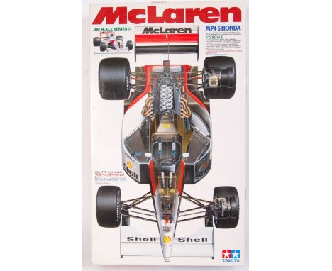 A 1:12 scale Tamiya Formula One racing car model kit: MP4/6 Honda McLaren from the Big Scale Series 26.. Appears mint and unu