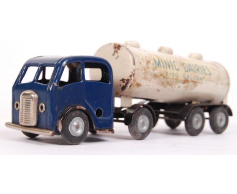 An original vintage Triang Minic ' Minic Dairies ' tinplate clockwork lorry and tanker. With correct Minic key. Working order