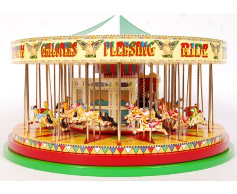 A 1:50 scale Corgi Fairground Attractions series 'The South Down Gallopers' diecast model carousel. No: CC20401. Mint &amp; c