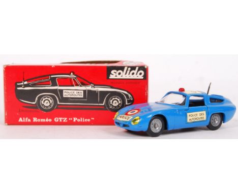 A scarce original vintage Soldio made No. 221 Alfa Romeo GTZ Police Car. Mint+ condition model, within a near mint original b