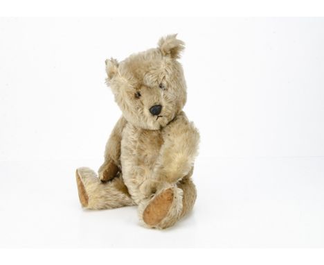  A Chiltern Hugmee teddy bear late 1950s,  with blonde mohair, orange and black plastic eyes, black plastic nose, black stitc