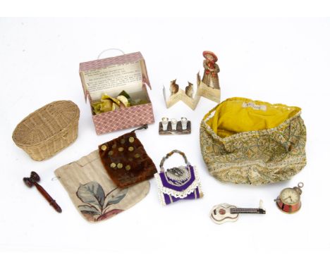 Needlework pieces, a first nation American raised beadwork pincushion and needle case, probably Iroquois; a cardboard guitar 