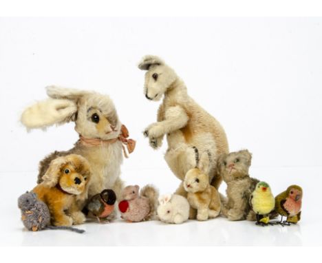 Post-war Steiff animals, a Linda kangaroo --9 ½in. (24cm.) high; two rabbits, a Cockie spaniel; a cat; woollen rabbit, mouse,