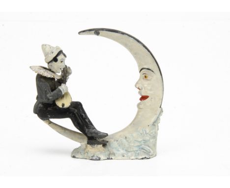 A rare German lead nodder pierrot serenading the moon,  probably Hyde, hand painted with tinplate ruff and holding a mandolin