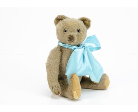 'Ludvig' a 1950s Steiff teddy bear,  with beige mohair, replaced glass eyes, pronounced muzzle, brown stitched nose, mouth an