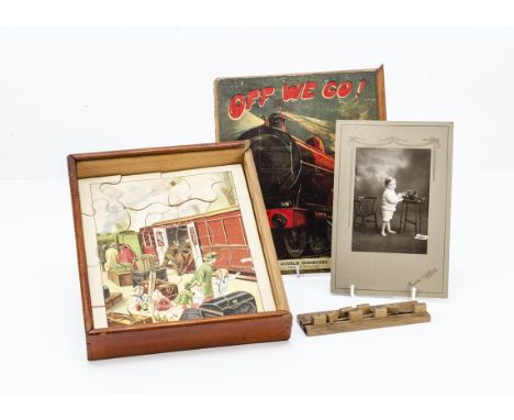 The New Double Dissect Puzzle 'Off We Go!' railway puzzle, two double-sided puzzles on wood with guide book, in original wood