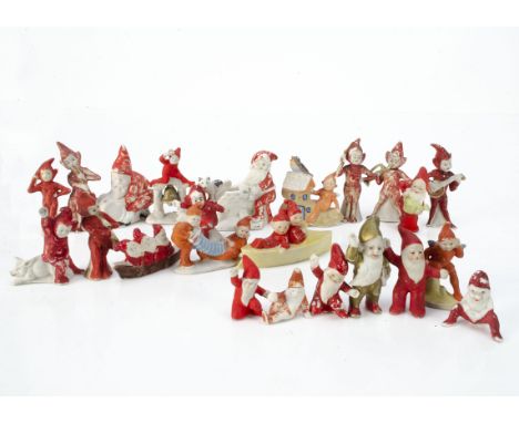 Bisque Pixie, Dwarf and Elf cake decorations,  twenty-three including two in a canoe, three in a canoe, one sat on a shoe hou