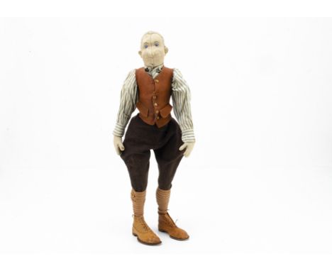 A rare Steiff male doll similar to the Sportsman circa 1912,  with characterful seamed felt face with blue and black glass ey