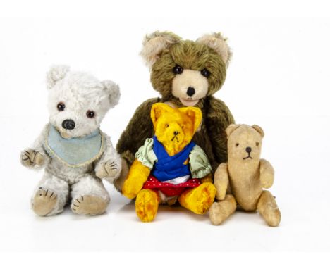 Four post-war Continental teddy bears, a Fechter teddy bear with brown mohair, orange and black glass eyes, swivel head and j