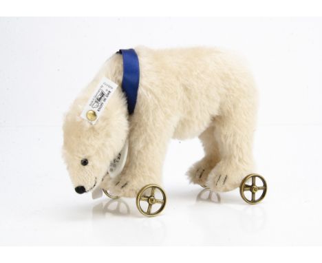 A Steiff limited Club edition Polar Bear on wheels 1910, 4635 for 1999/2000, in original box with certificate