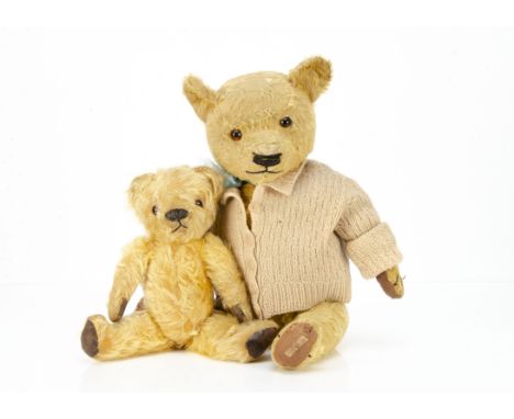 A Chad Valley Magna type teddy bear 1930s,   with golden mohair, replaced glass eyes, muzzle with black stitched horizontal n