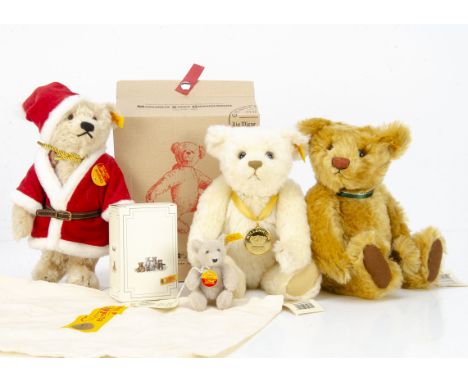 Four yellow tagged Steiff teddy bears, a Father Christmas teddy bear --10 ½in. (26.5cm.) high; two  Danbury Mint year bears f