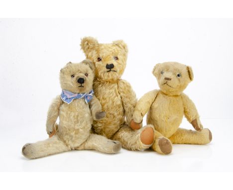 Three British teddy bears.  a Jason Toys teddy bear with golden mohair, orange and black glass eyes, black stitched nose and 