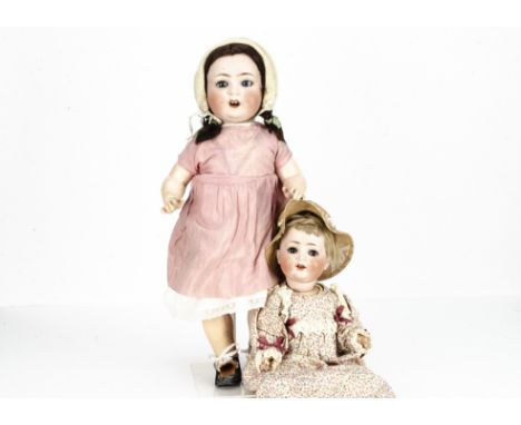 Two German bisque headed character babies, a Porzellanfabrik 169 with blue lashed sleeping eyes, blonde mohair wig, floral dr