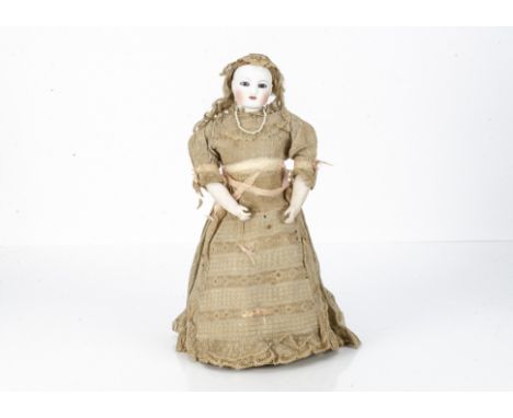 An early Jules Steiner clockwork walking automaton doll,  with pale pressed bisque head, fixed glass striated dark blue eyes,