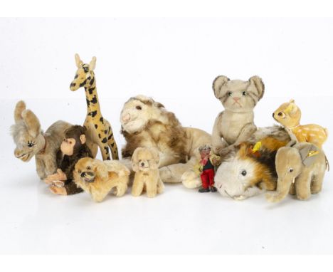 Post-war Steiff animals, a five-way jointed tabby cat --7in. (18cm.) long;  a Pekinese, an elephant, a guinea pig  and Bambi,