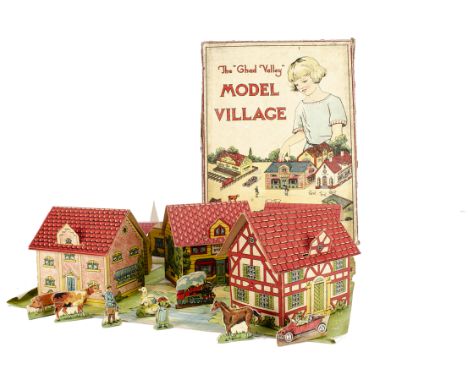 A Chad Valley cardboard Model Village,  with seven folding printed buildings, a paper floor plan, a two-dimensional locomotiv