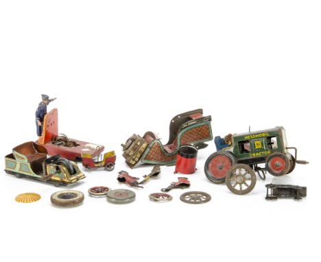 German tinplate toys and spares, a Hessmobil Tractor (not working and man missing head); two other lithographed tinplate moto