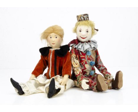 A well made felt clown doll in the style of Steiff, with blonde mohair hair, swivel head, jointed limbs and floral printed co
