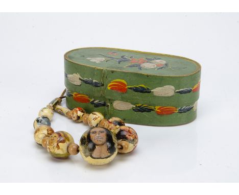 An unusual turned wooden necklace painted with famous portraits,  including a self portrait of Van Gough, the Mona Lisa, Fede