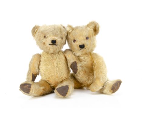 Two 1940s British teddy bears,  one probably Chad Valley with golden mohair, orange and black glass eyes, muzzle with black s
