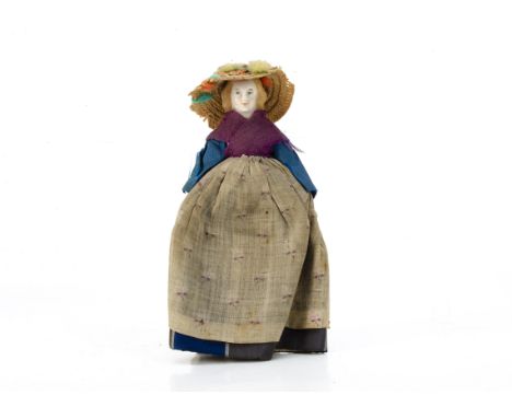 A 19th century bisque should head doll's house doll, with blonde painted and moulded hair, stuffed body, bisque limbs with re