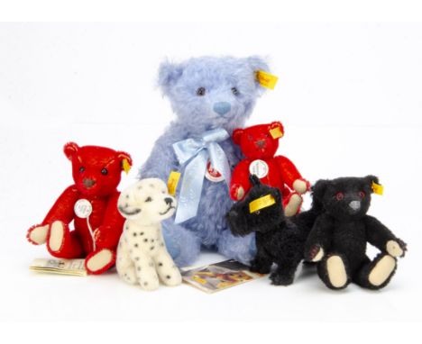 Six Steiff yellow tagged teddy bears and dogs, two red, one pale blue --11in. (28cm.) high, a black bear, a Scottie and Dalma