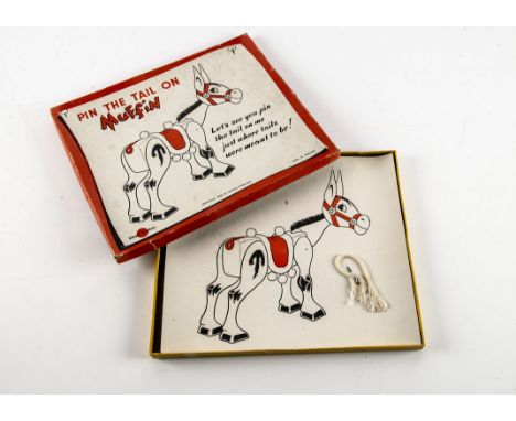 A Chad Valley Pin the Tail on Muffin game, with card featuring a tailless Muffin the Mule, cord tail on pin, in original box,