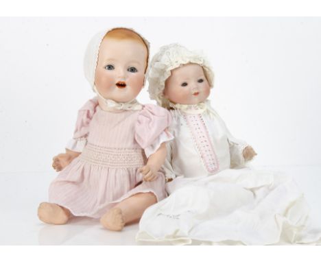 Two German bisque headed character babies, an Ernst Heubach 415 with blue sleeping eyes, blonde painted moulded side-parted h