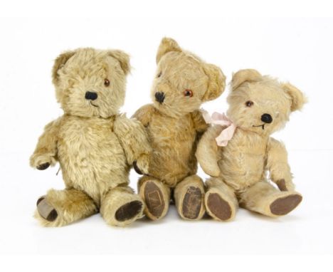 Three post-war teddy bears,  all with mohair, swivel heads and jointed limbs, two Chad Valley , one with label; and another p