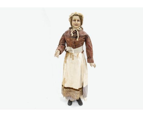 A rare early 20th century poured wax headed shop mannequin,  of a girl with blue inset glass eyes with fine veins, inserted h