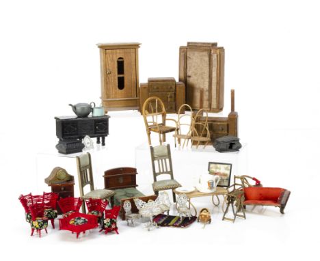 A quantity of dolls' house furniture,  including a Britains highchair rocker; a soft metal fronted mantle clock; a German oak